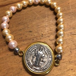 Beautiful pearl with saint Benedict medal